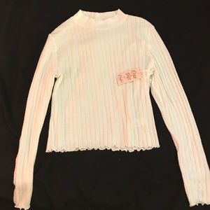 Long sleeved mock neck shirt